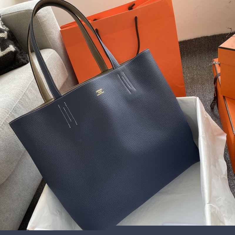 H**mes shopping bags